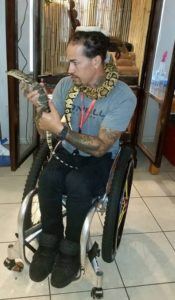 Jerry Diaz holding a snake
