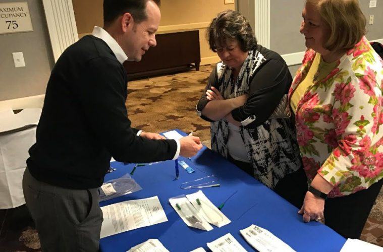 Cure Medical's Chris Sellwood answers questions from urological nurses at the 2016 SUNA UroLogic Conference.