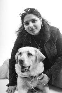 Day Al-Mohamed (Director, Executive Producer of the Invalid Corps Documentary) with her dog