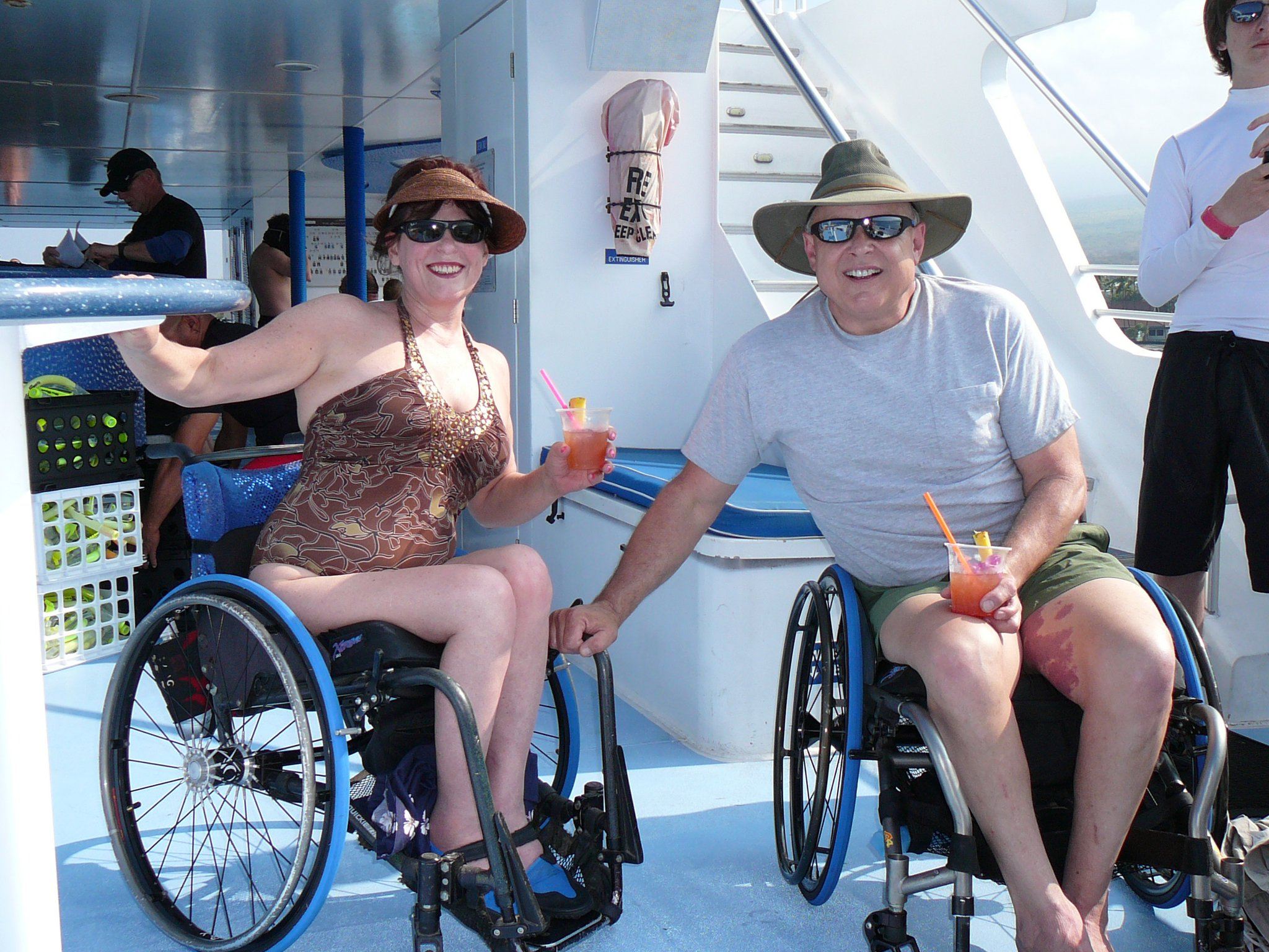 Julienne vowed never to let Transverse Myelitis slow her down. She and her husband Dan (pictured) travel often, like in this trip to Kona, Hawaii.