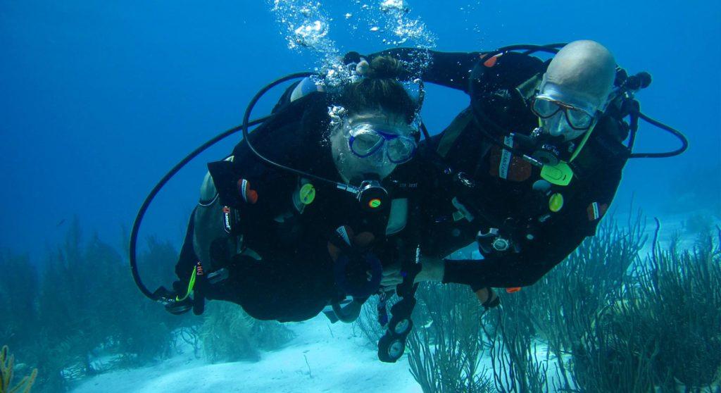 Diveheart founder Jim Elliott working with another diver