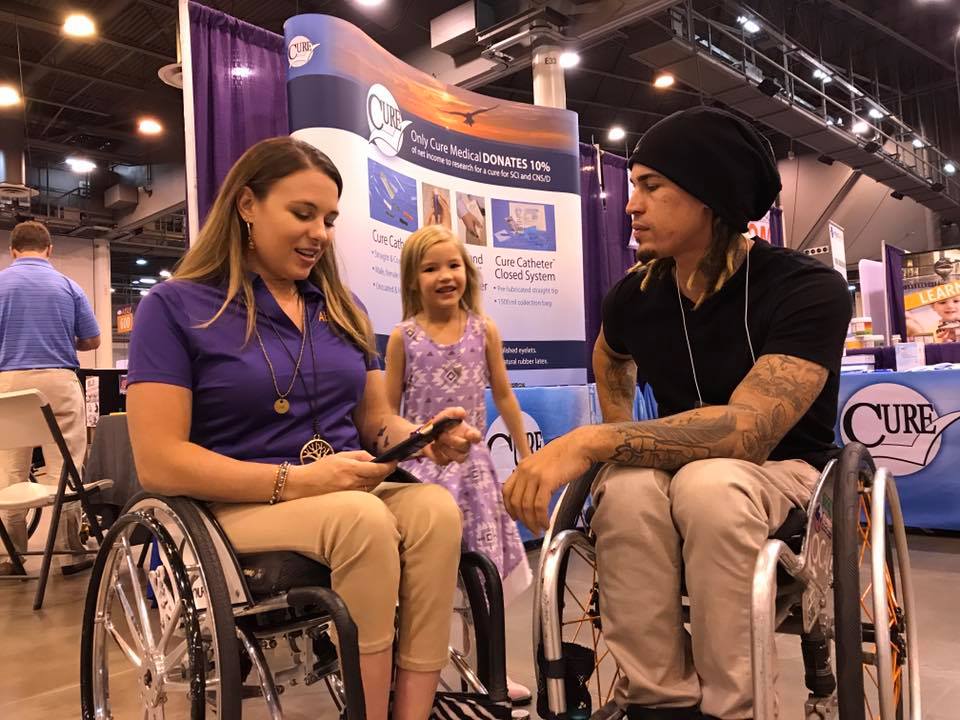 Pictured here with WCMX star & Cure Advocate Jerry Diaz, Kristina works as the Abilities Expo Meet Up Zone Ambassador. Coloring Ambassador Miss Kamryn (age 6) often travels with her mom to Abilities Expos too!