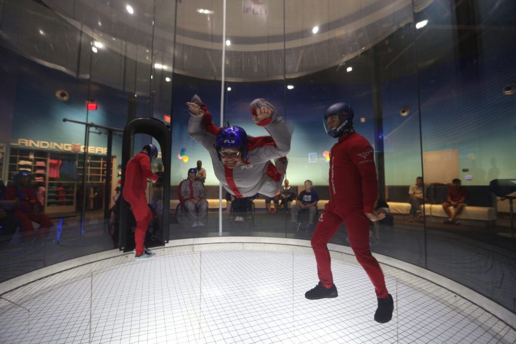 iFly provides additional instructors in the wind for flyers with disabilities to help maintain stability and control any affected limbs accordingly