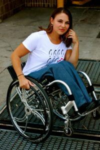 Kristina Rhoades is a life coach, writer, entrepreneur, spokesperson and a long-time wheelchair user.