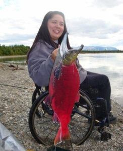 Woman in wheelchair fishing