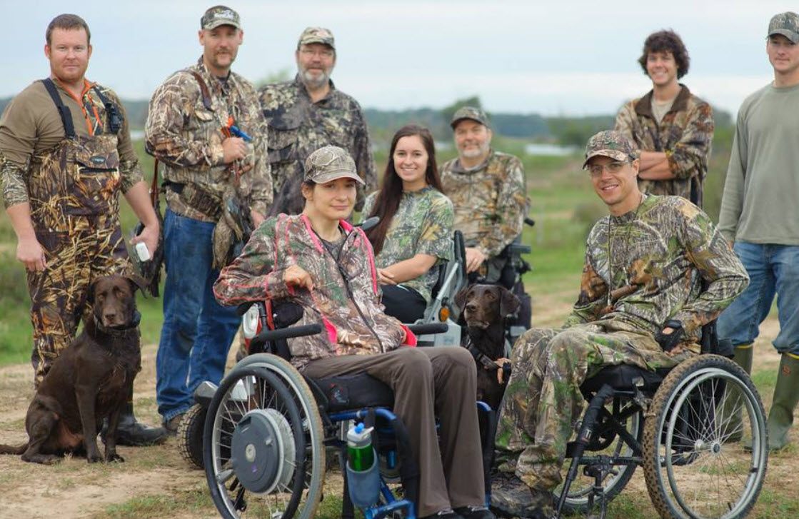 Cure Advocate Chad Waligura with a group of hunters.