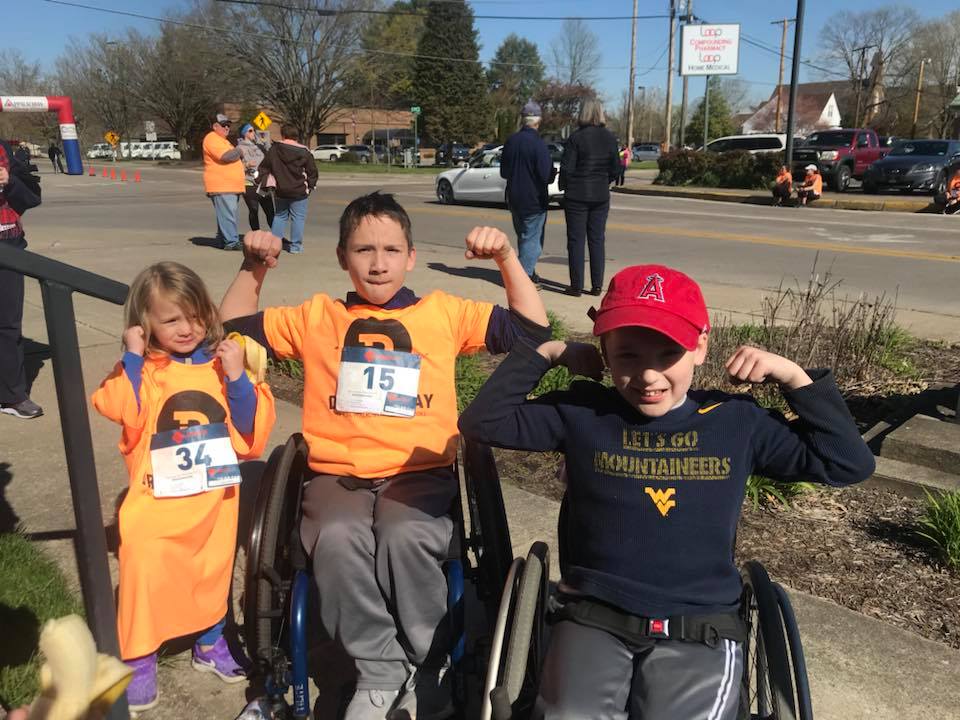 Here is Bryson Dowdy, "Still going strong after finishing Drews Day 5K to raise money for Mountaineer Spina Bifida Camp