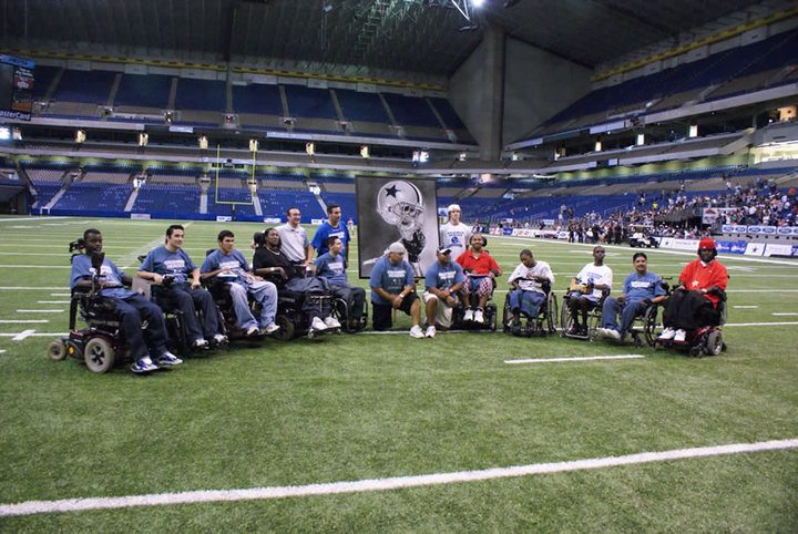 wheelchair users on football field for gridiron heroes
