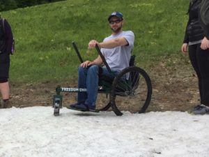 chris collin rides a freedom chair