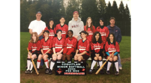 Photo of a women's softball team with sign indicating it is the 2006 peewee Coquitlam team named the Hurricanes